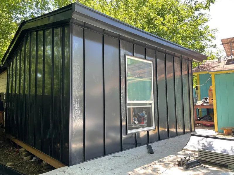 Black standing seam metal wall panels for Metal Roof Installation in Marietta